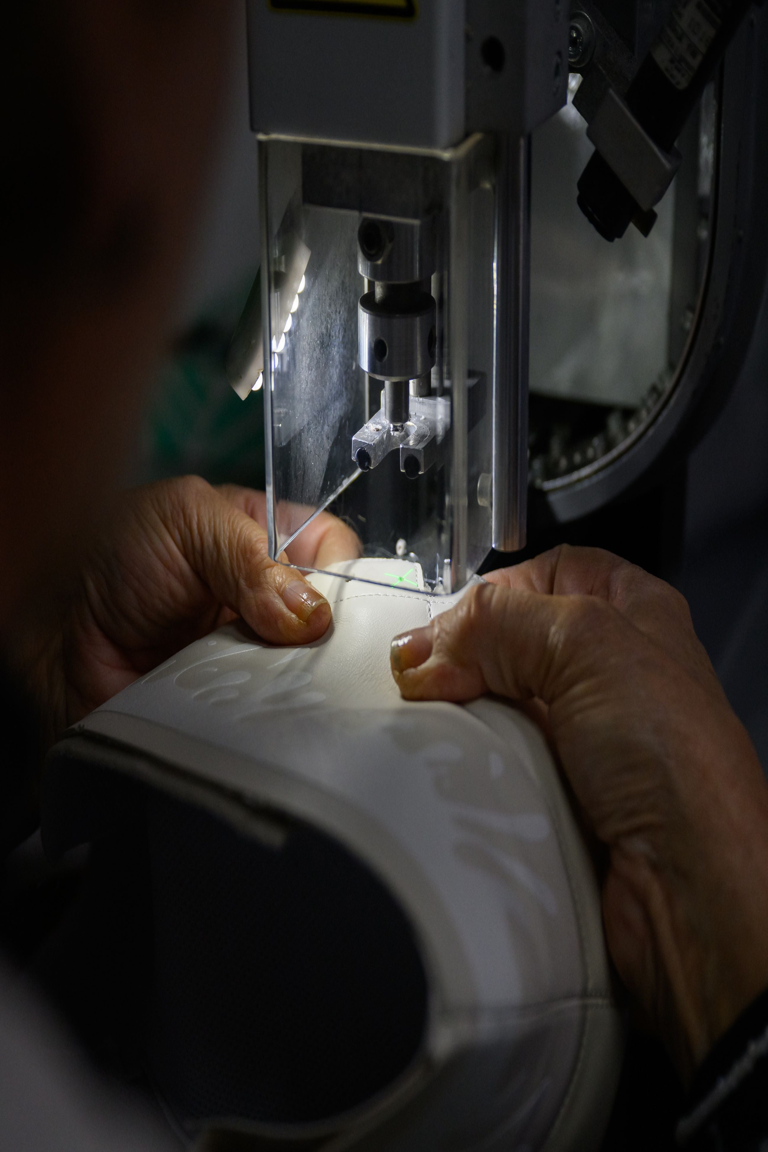 Seamstress stiiching our 33MB premium leather sneaker