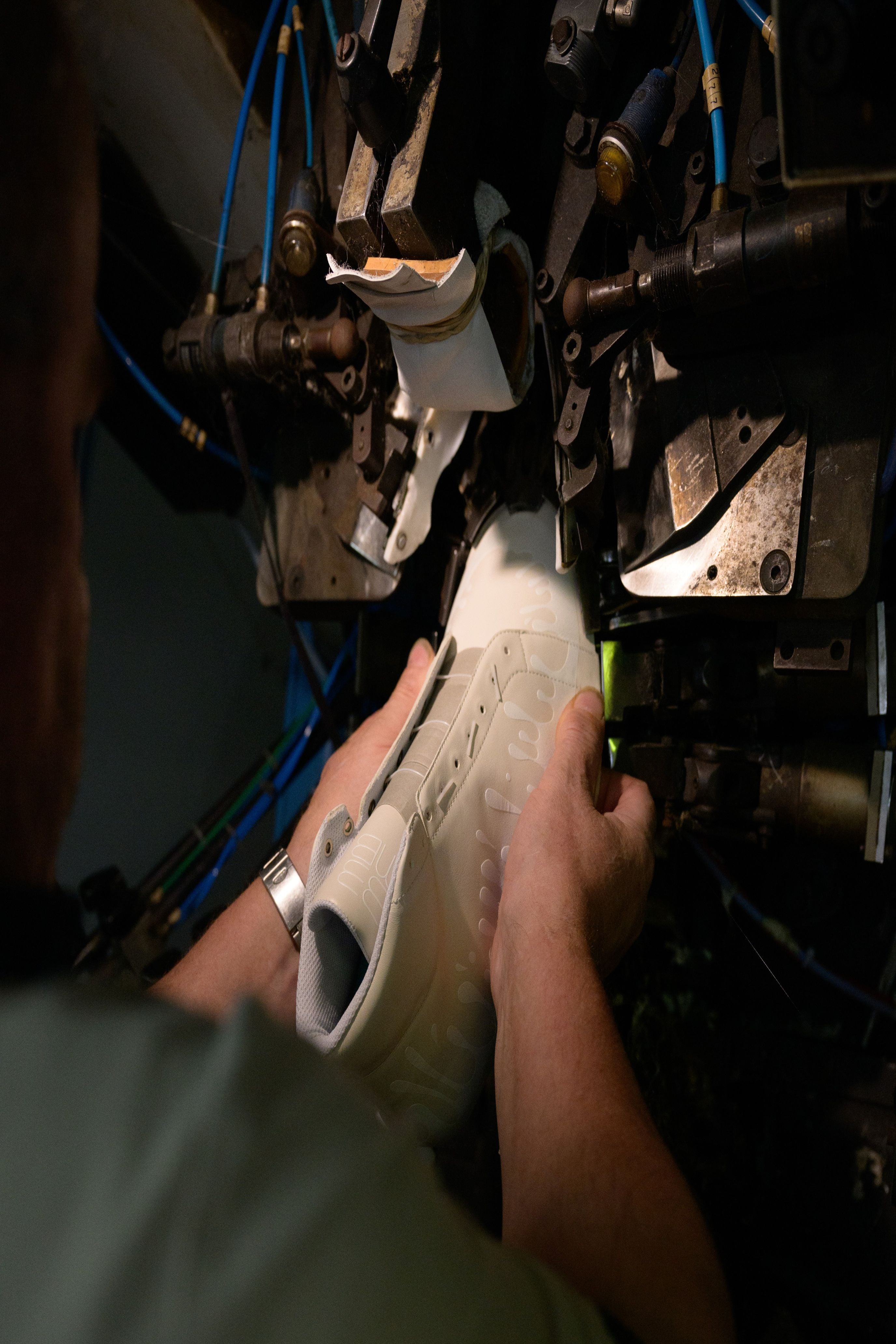 Craftman molding our 33MB premium leather sneaker