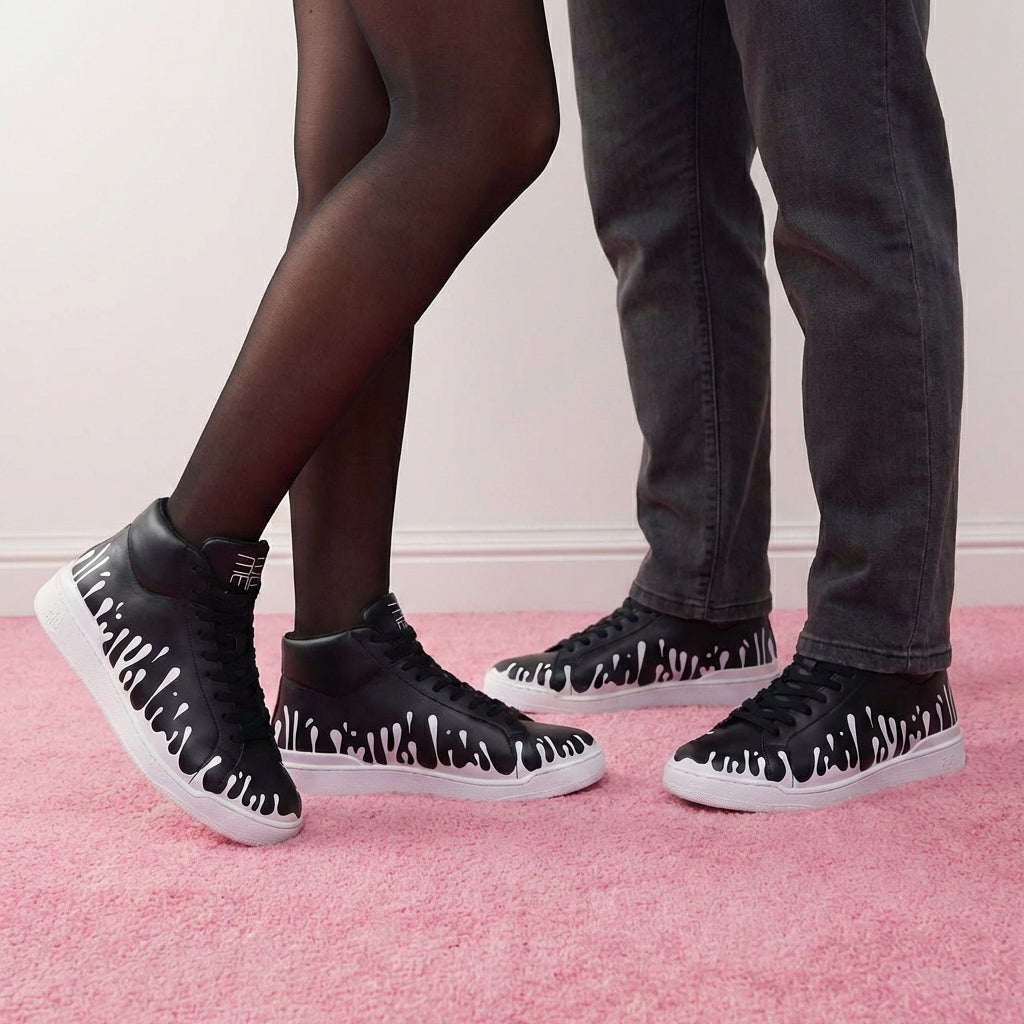 33MB Yin mid-top sneakers styled with all-black minimalist outfits, highlighting the stark white drops and sleek urban silhouette.