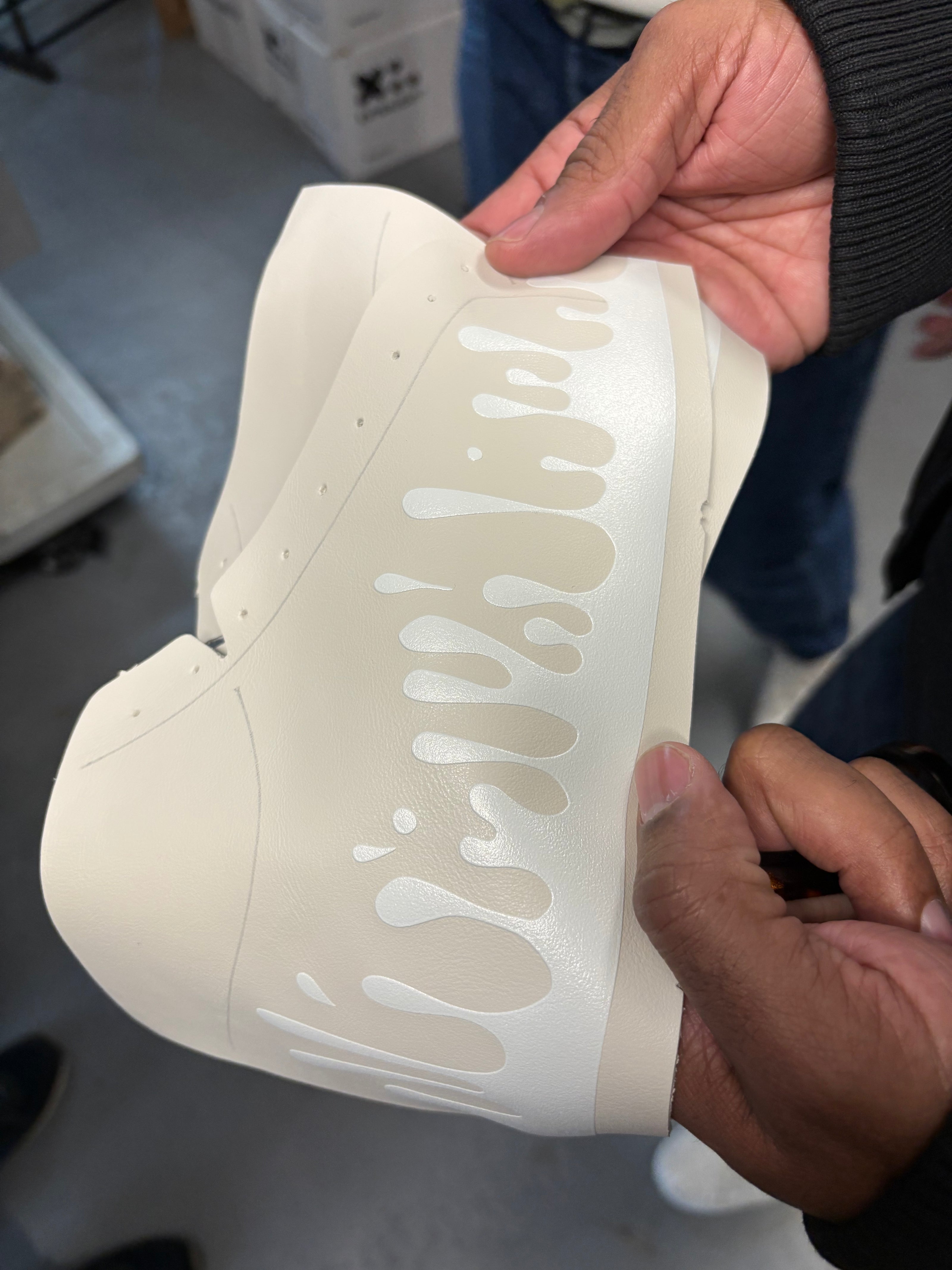 Checking the quality of our 33MB premium leather sneaker
