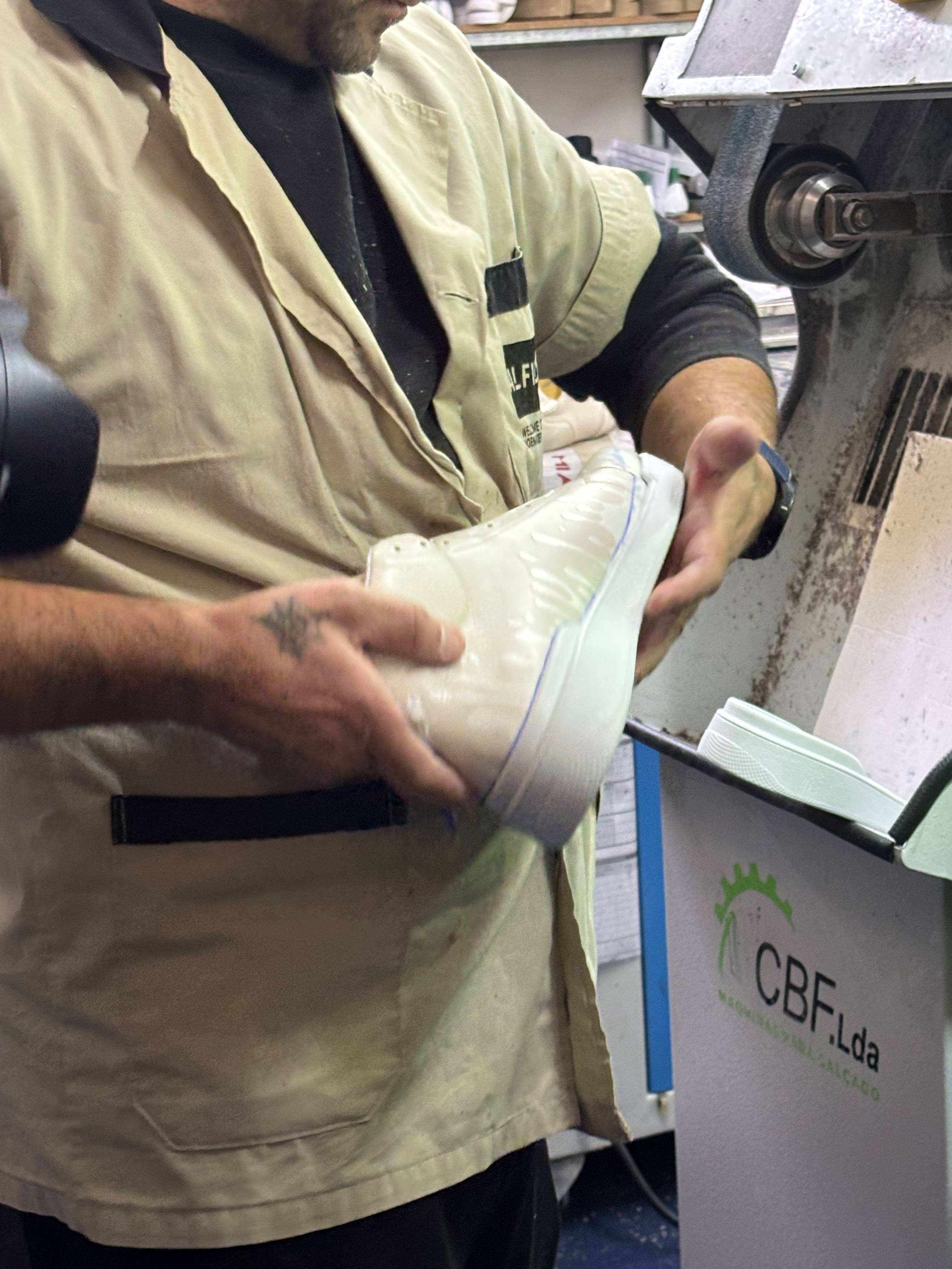 Artisan shaping our 33MB premium leather sneaker