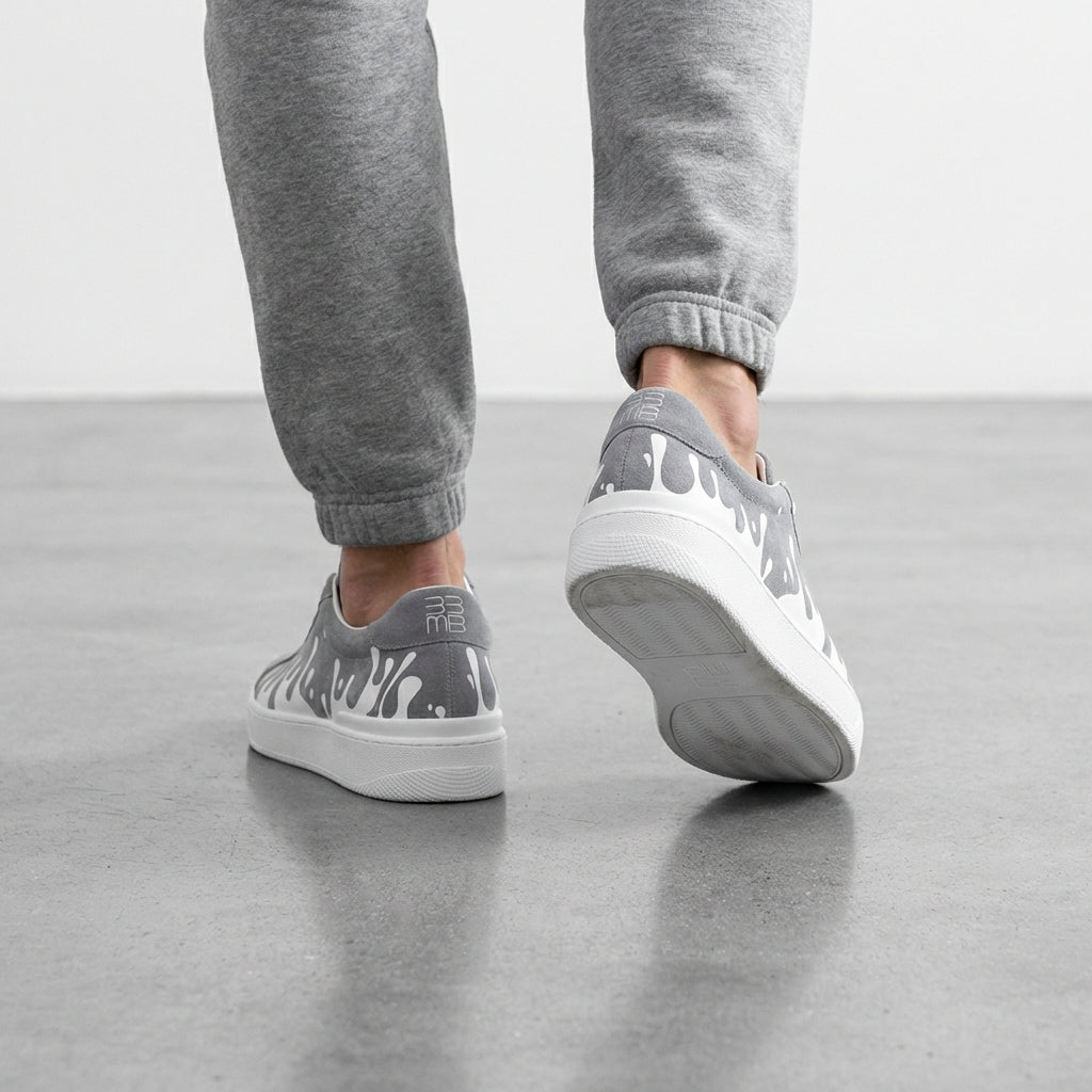 33MB Splash dark grey suede sneakers styled with grey joggers, highlighting the tactile texture and sleek urban silhouette.