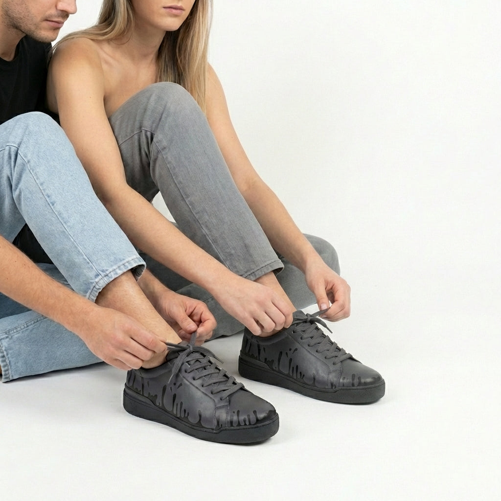 33MB Nighty sneakers styled with  denim, highlighting the sleek urban silhouette and versatile monochromatic  Zero Gravity® signature motif representing hope.