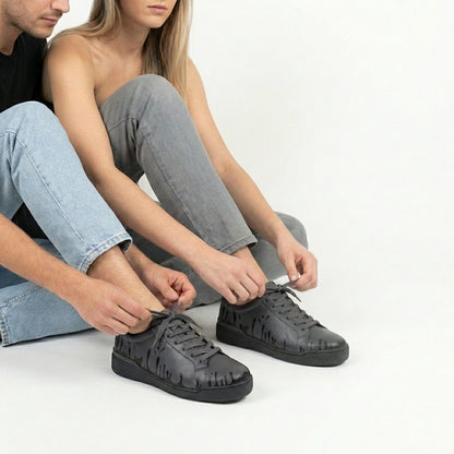 33MB Nighty sneakers styled with  denim, highlighting the sleek urban silhouette and versatile monochromatic  Zero Gravity® signature motif representing hope.