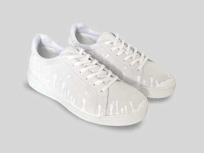 Pair of white suede low-top sneakers with exclusive printed white drops design and white soles