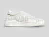 Side profile of 33MB Nuage low-top sneakers in light grey Italian suede, showcasing the white Zero Gravity paint drops traveling upward from the sole.