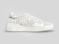 Side profile of 33MB Nuage low-top sneakers in light grey Italian suede, showcasing the white Zero Gravity paint drops traveling upward from the sole.