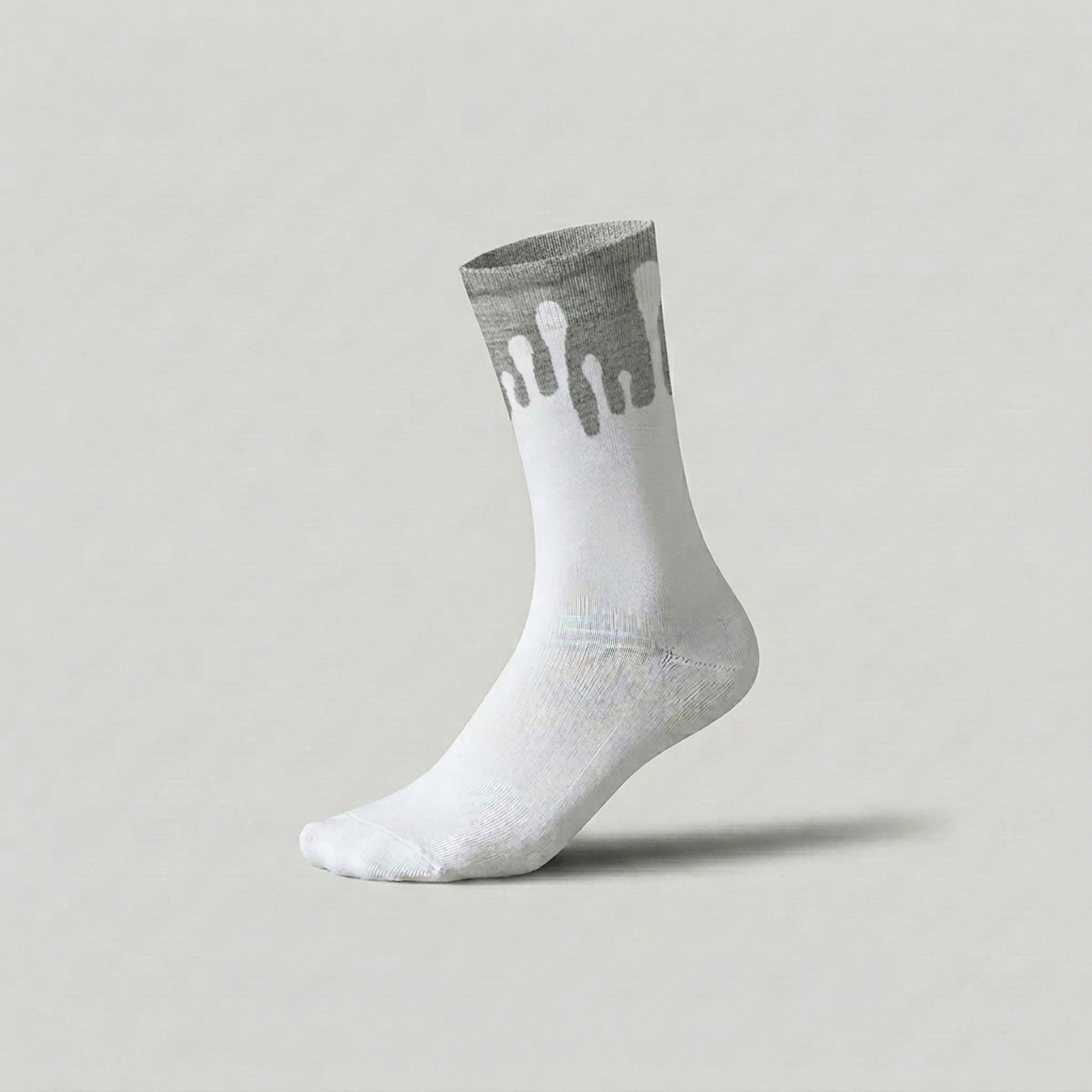 Lunar white and light grey socks showcasing the 33MB Zero Gravity© upward drop design on a minimalist background.