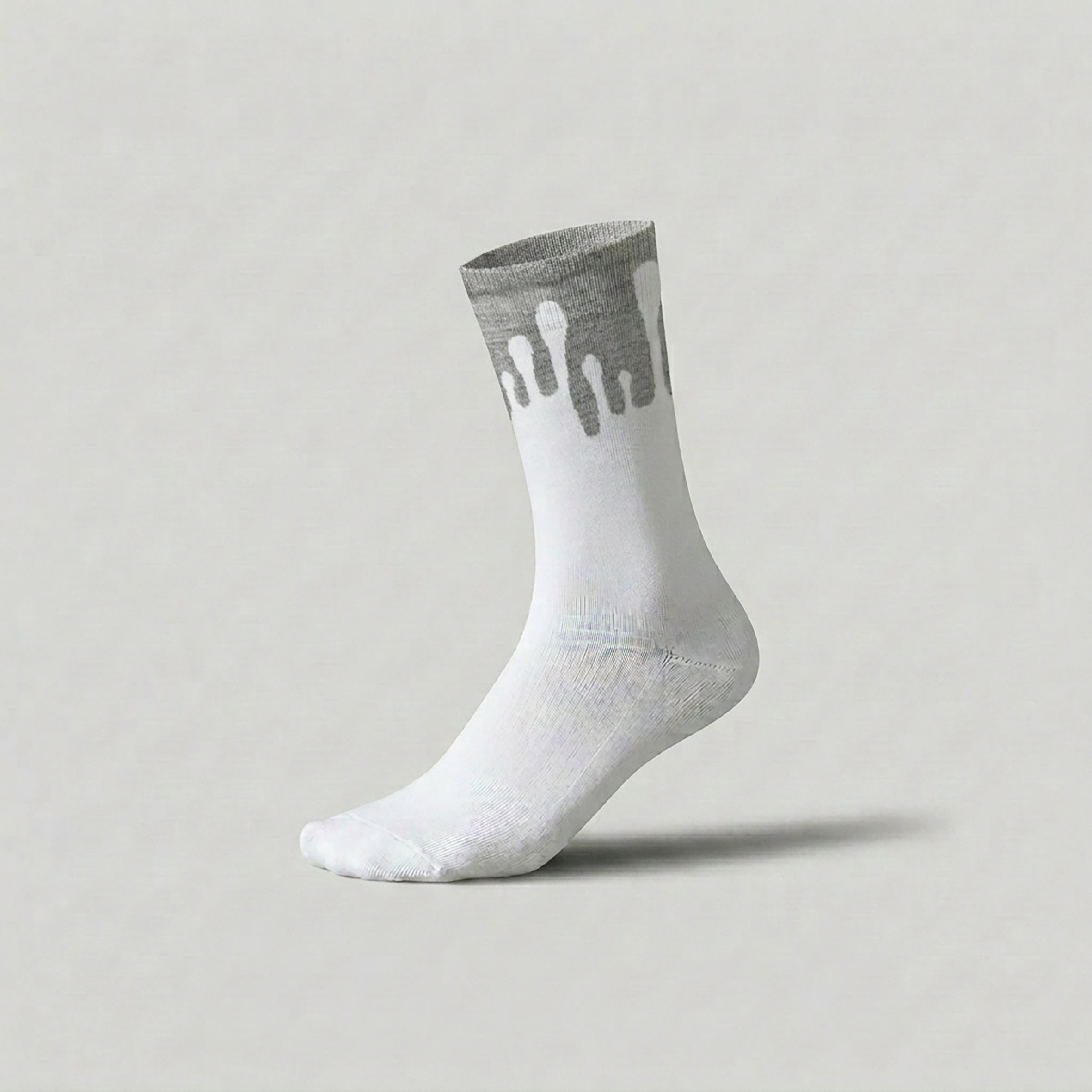 Lunar white and light grey socks showcasing the 33MB Zero Gravity® signature motif of upward drops symbolizing hope on a minimalist background. 