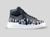 Side profile of 33MB Yin mid-top sneakers in black leather, showcasing the high-contrast white Zero Gravity paint drops traveling upward from the sole.