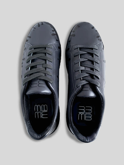 Top view of pair of dark grey Chrome-free Nappa leather low-top sneakers with exclusive printed black drops design