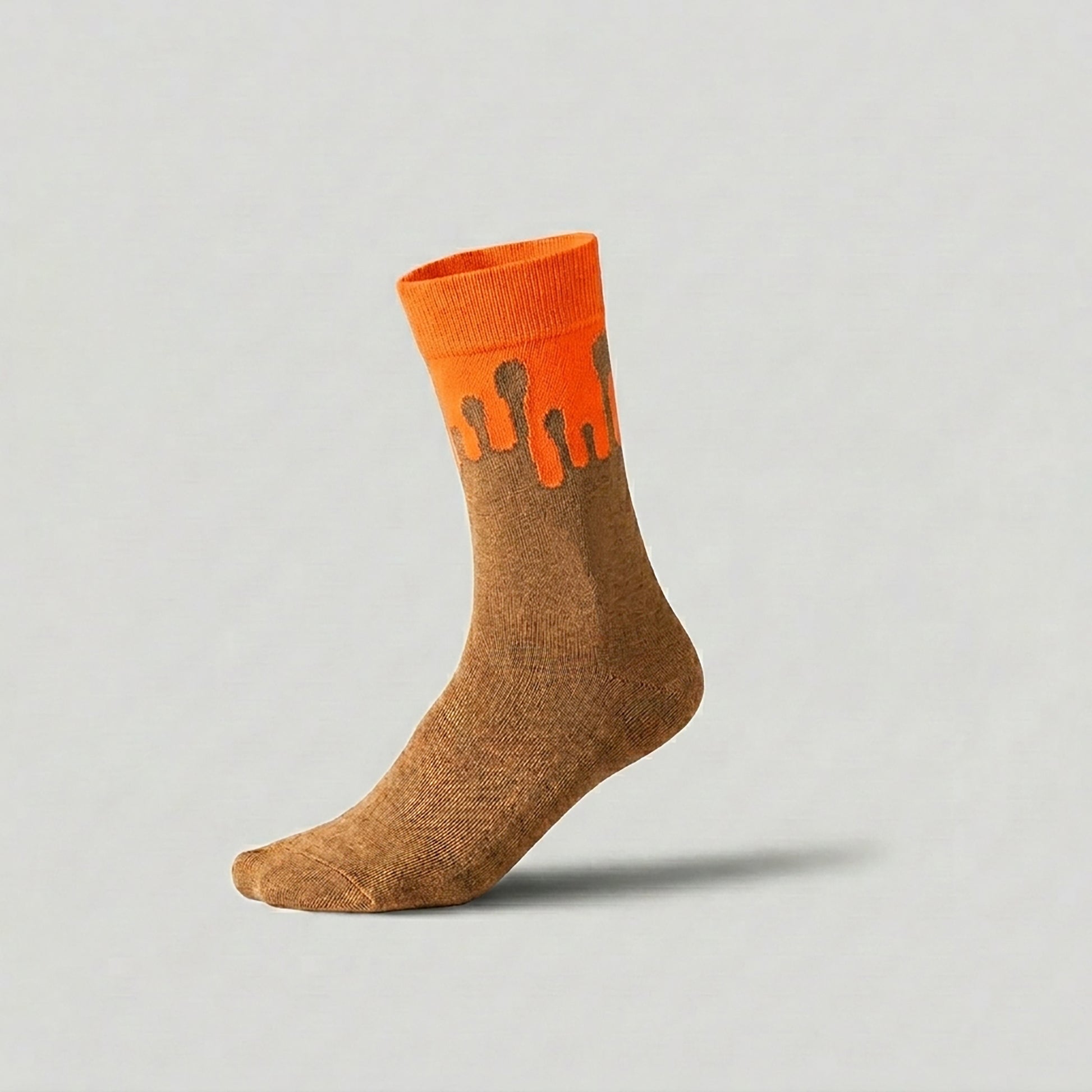 Solar orange and camel socks showcasing the 33MB Zero Gravity© signature motif with upward drops symbolizing hope.