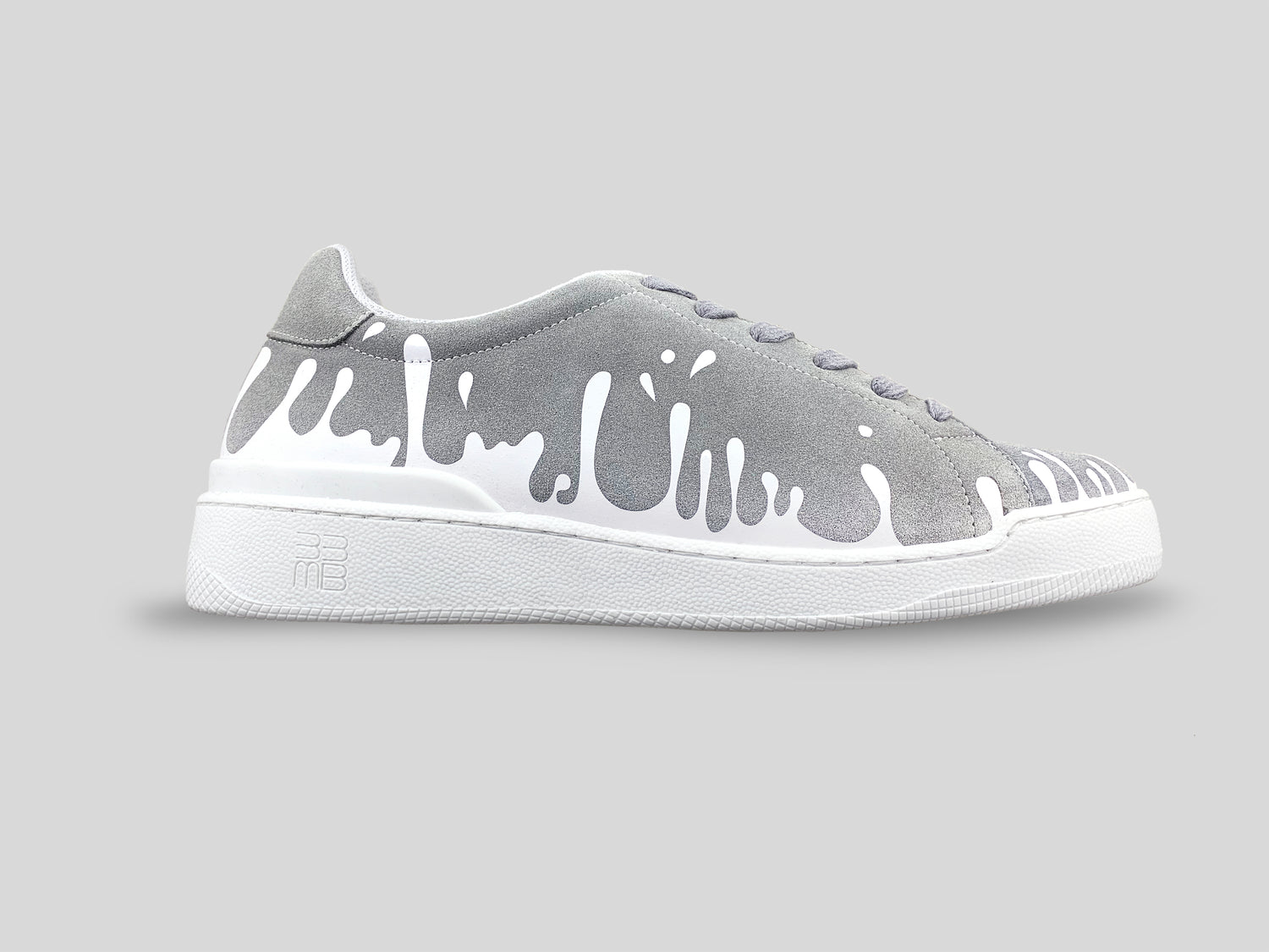 Grey suede low-top sneaker with exclusive printed white drops design and white sole
